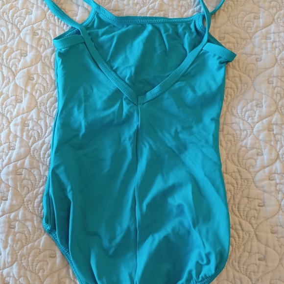 Teal cap sleeve leotard. Size child 6-7. - Picture 2 of 3